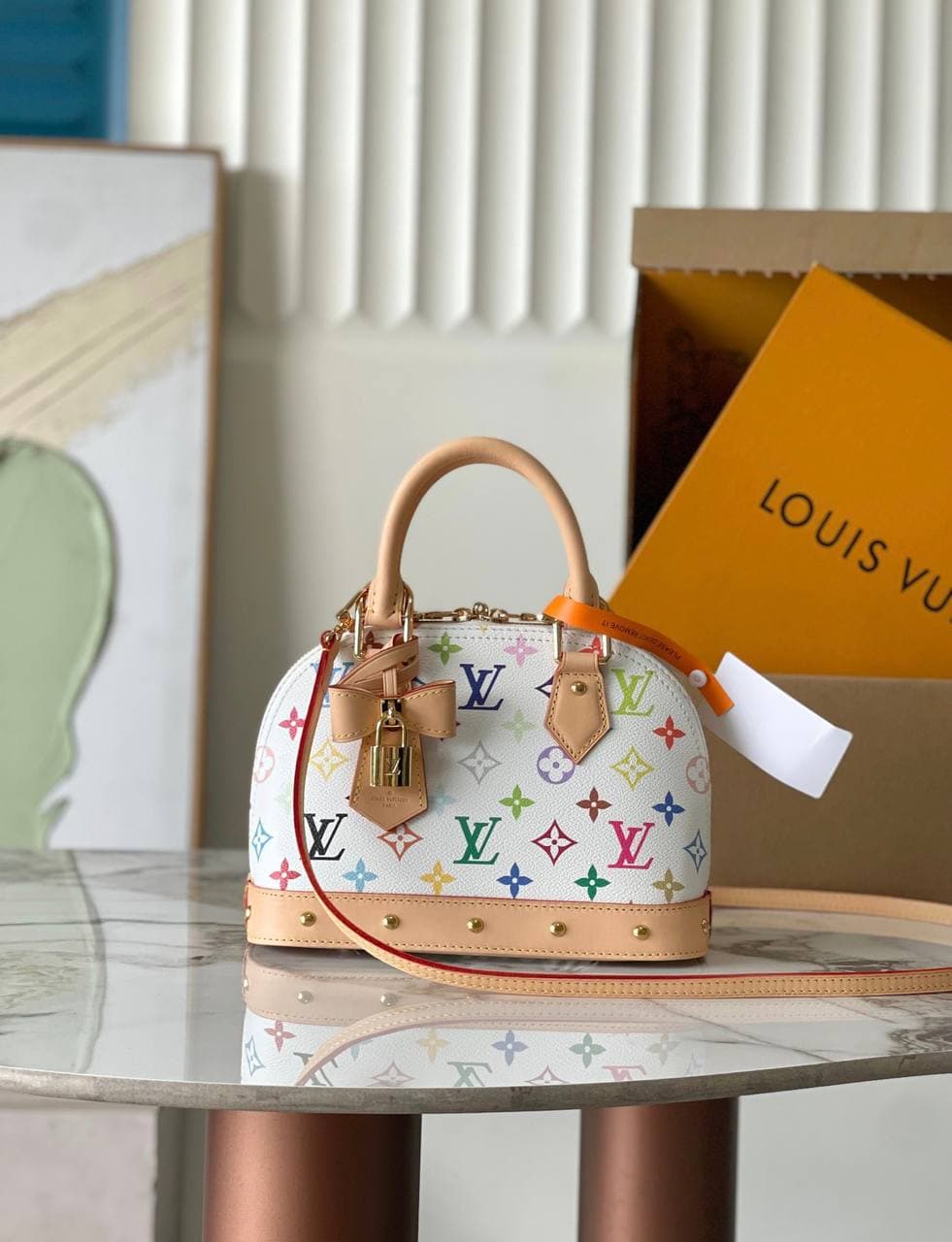 Сумочка Louis Vuitton Alma